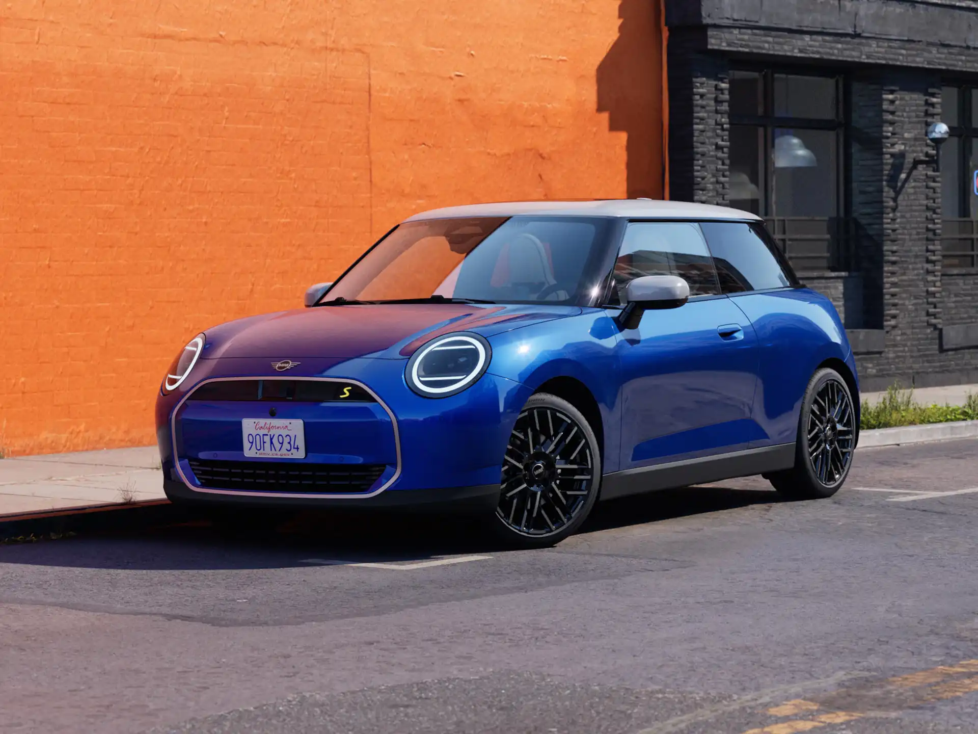 Video showcasing the interior and exterior of an all-electric MINI Cooper in detail. The camera pans over the dashboard, highlighting design elements
